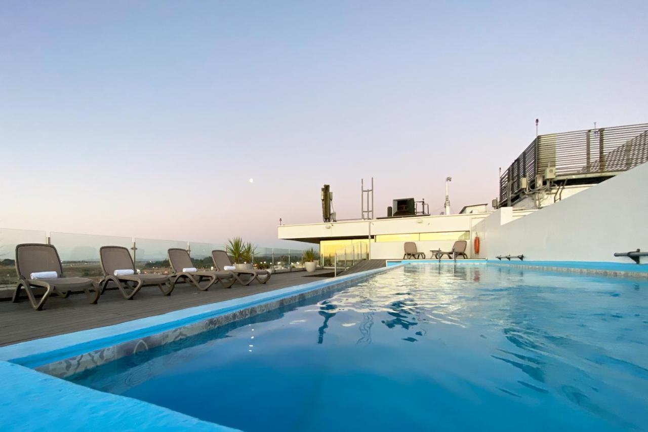 Hotel Wyndham Concepcion Pettra Zewnętrze zdjęcie Rooftop pool